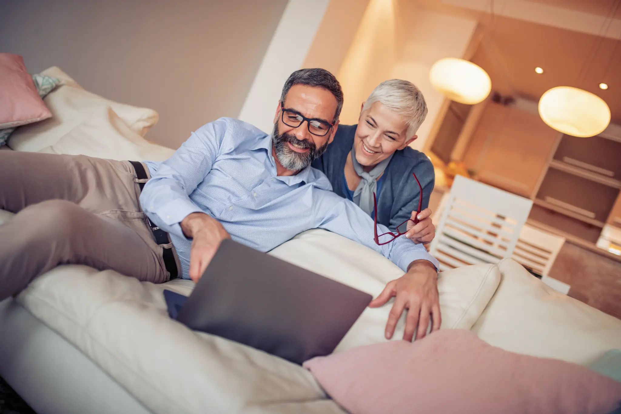 Couple using Jortty on laptop